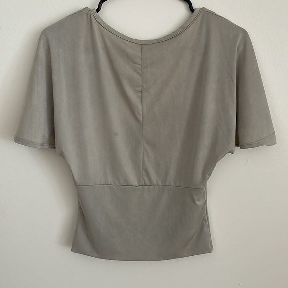 Smooth silver top with ruffle sleeves, and a plunging neckline - Picture 3 of 6
